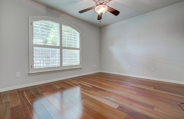 unfurnished room featuring ceiling fan and hardwood / wood-style floors