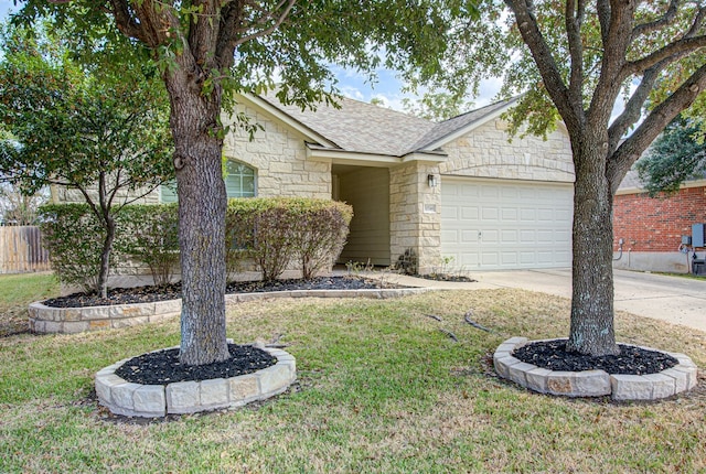 ranch-style house with a garage and a front lawn