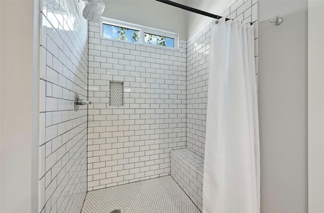 bathroom featuring walk in shower