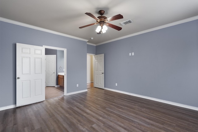 unfurnished bedroom featuring crown molding, ceiling fan, ensuite bathroom, and dark hardwood / wood-style flooring