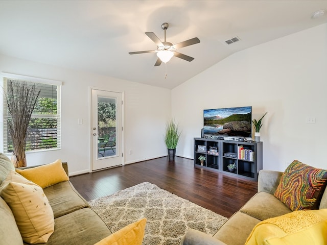 living room featuring ceiling fan, lofted ceiling, and dark hardwood / wood-style flooring