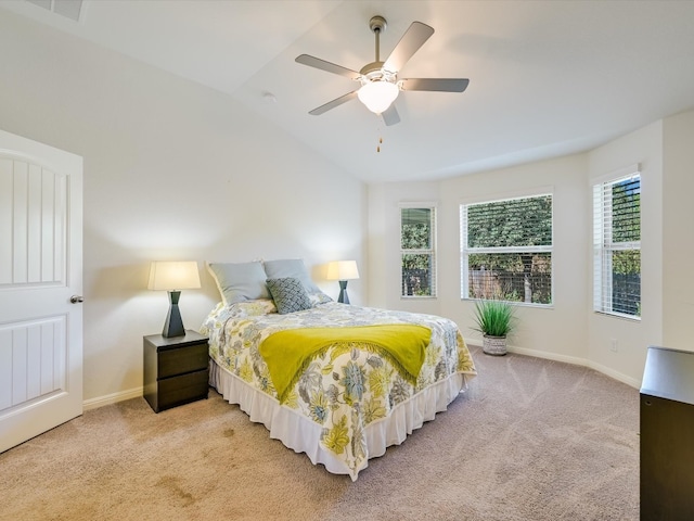 bedroom featuring ceiling fan, lofted ceiling, and carpet floors