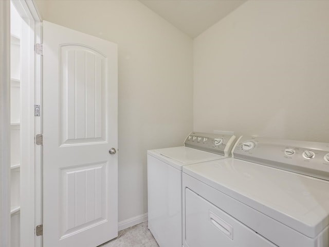 washroom featuring washing machine and dryer