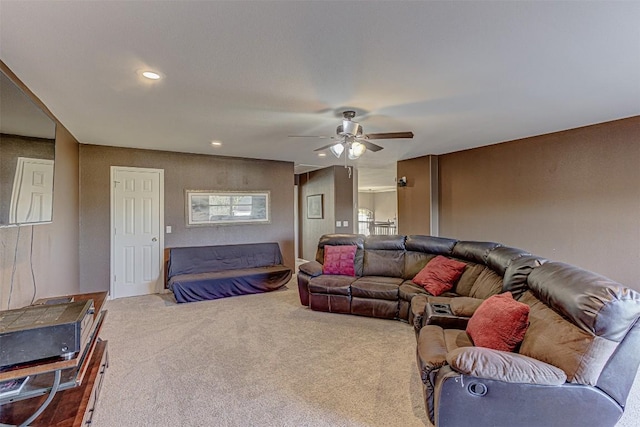 living room with recessed lighting, a ceiling fan, and carpet