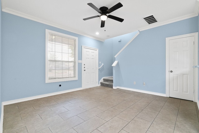 interior space featuring ornamental molding, light tile patterned flooring, and ceiling fan