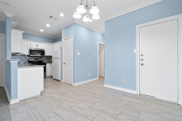 kitchen with white cabinetry, appliances with stainless steel finishes, ornamental molding, and hanging light fixtures