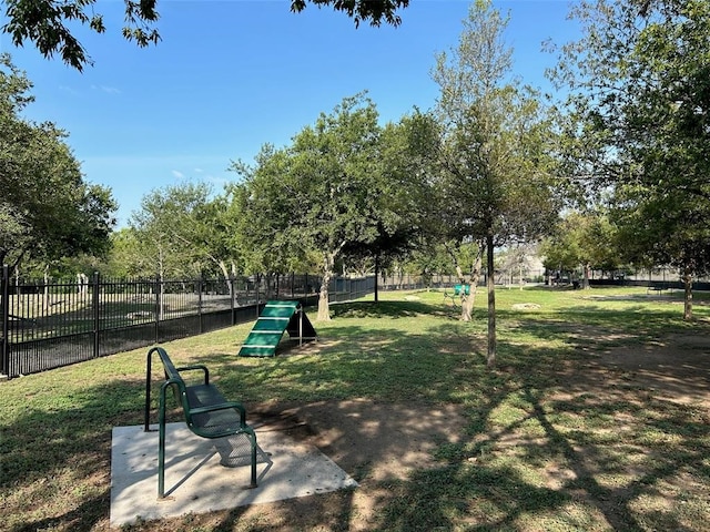 view of property's community featuring a yard