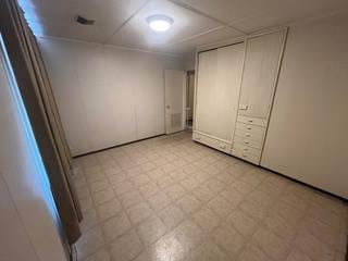 4906 Westfield Dr, Austin, TX 78731 - unfurnished bedroom featuring light floors and a closet