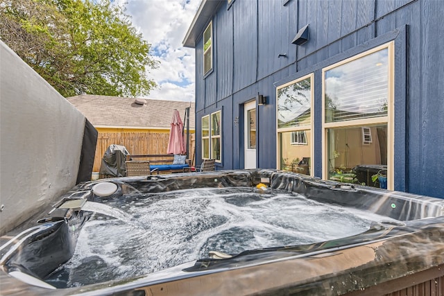 view of patio / terrace featuring a hot tub