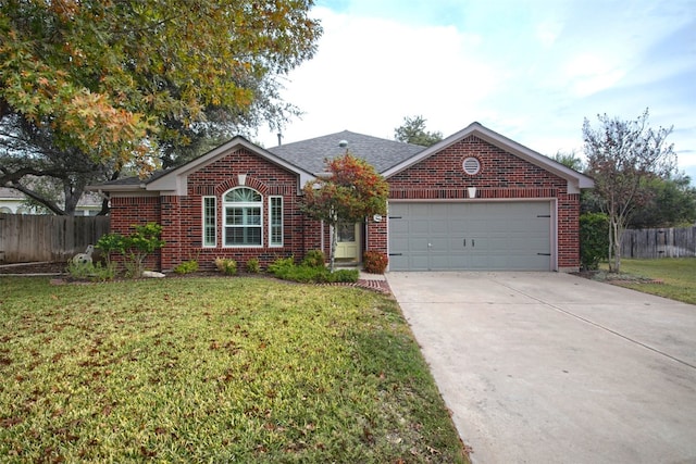 single story home featuring a garage and a front lawn