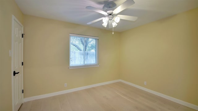 unfurnished room featuring ceiling fan and light hardwood / wood-style floors