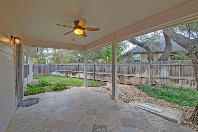 view of patio featuring ceiling fan