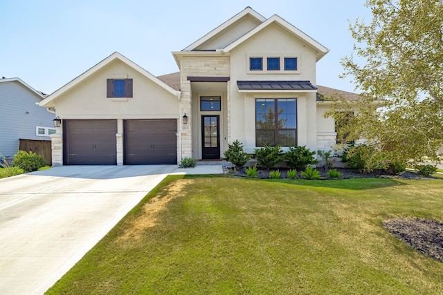 view of front facade featuring a front yard and a garage