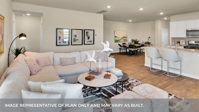 living room featuring light hardwood / wood-style flooring