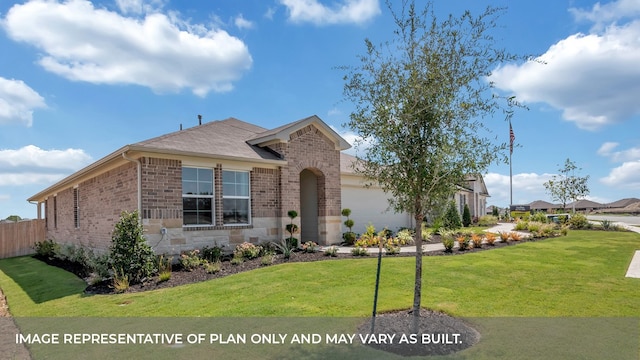 ranch-style home featuring a front yard and a garage