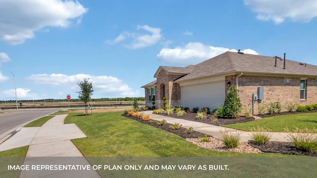 view of home's exterior featuring a garage and a lawn