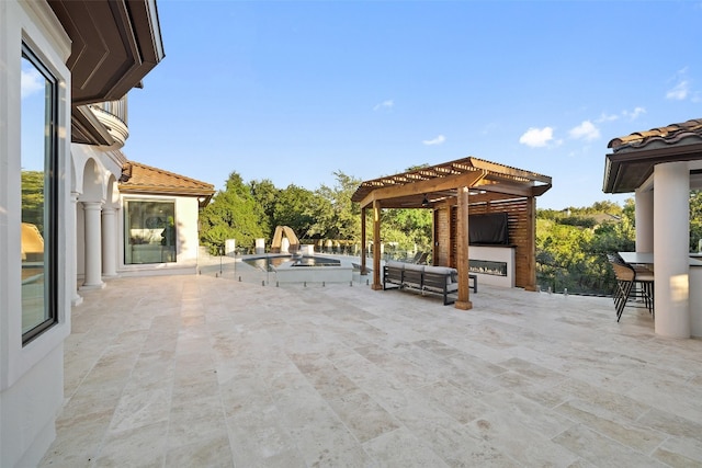 view of patio / terrace featuring a jacuzzi, a bar, and a pergola