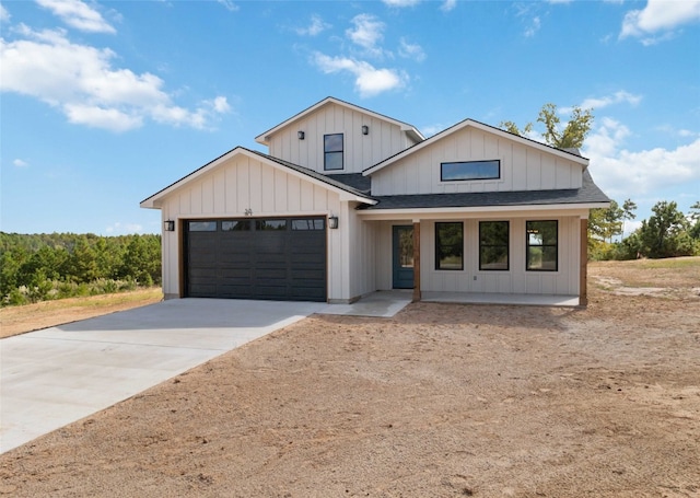 modern farmhouse style home featuring a garage