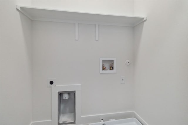 343 Cottle Town Rd Unit A, Smithville, TX 78957 - laundry area featuring hookup for a gas dryer, hookup for a washing machine, and electric dryer hookup
