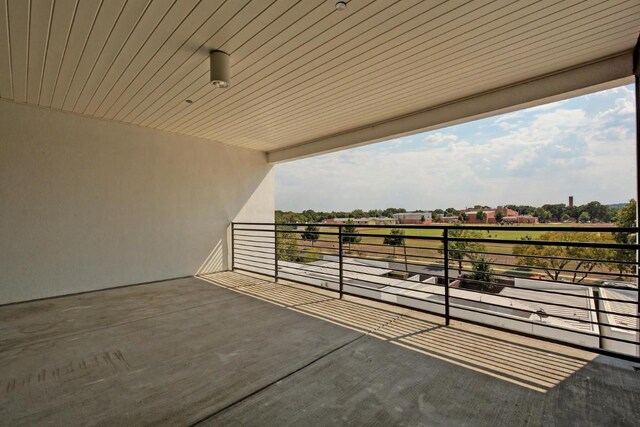 view of patio / terrace with a balcony