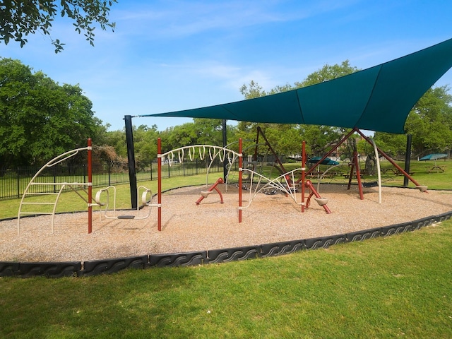 view of play area featuring a lawn