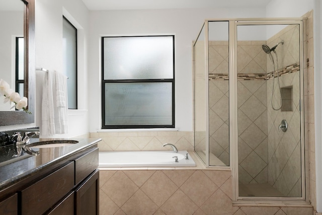 bathroom with plus walk in shower and vanity