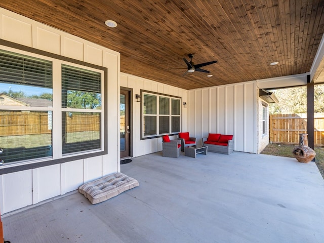 view of patio featuring ceiling fan and an outdoor living space