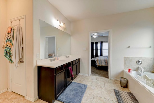 225 Shale Cir, Buda, TX 78610 - full bath featuring ensuite bath, double vanity, a bath, and tile patterned flooring