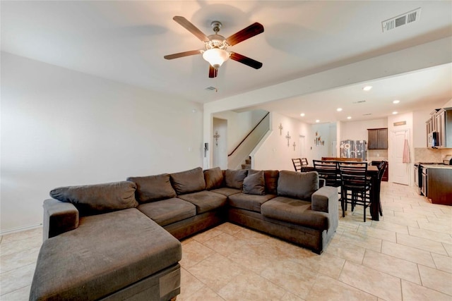 225 Shale Cir, Buda, TX 78610 - living area featuring stairway, ceiling fan, recessed lighting, and light tile patterned floors