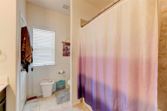 225 Shale Cir, Buda, TX 78610 - bathroom featuring vanity, tile patterned flooring, and a shower with shower curtain