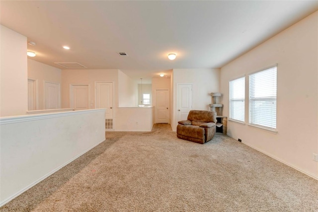 225 Shale Cir, Buda, TX 78610 - living area featuring carpet, baseboards, and recessed lighting