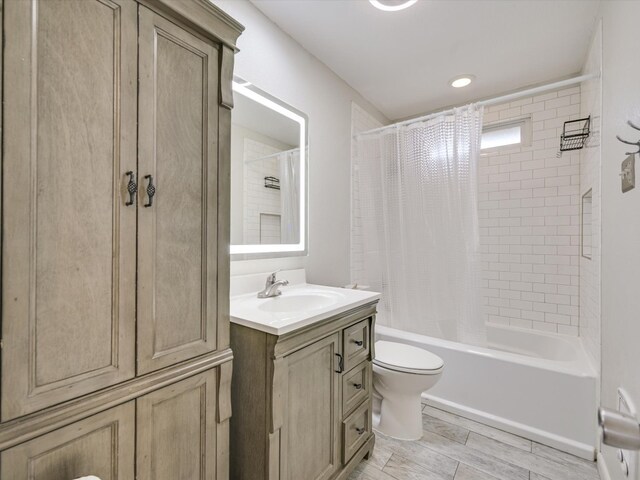 full bathroom with vanity, toilet, and shower / bathtub combination with curtain