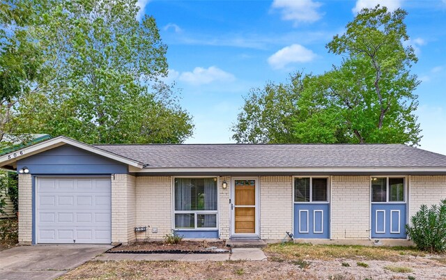 single story home with a garage