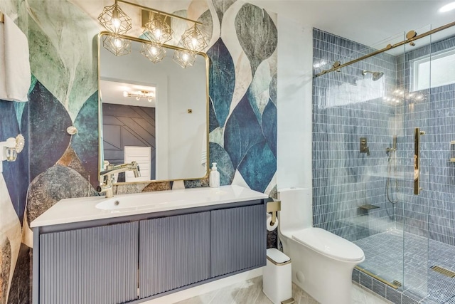 bathroom featuring walk in shower, vanity, and toilet