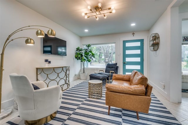 living room with an inviting chandelier