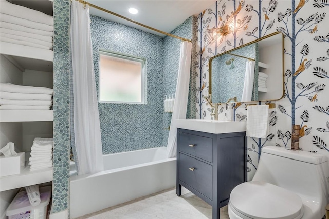 full bathroom with shower / tub combo with curtain, vanity, and toilet