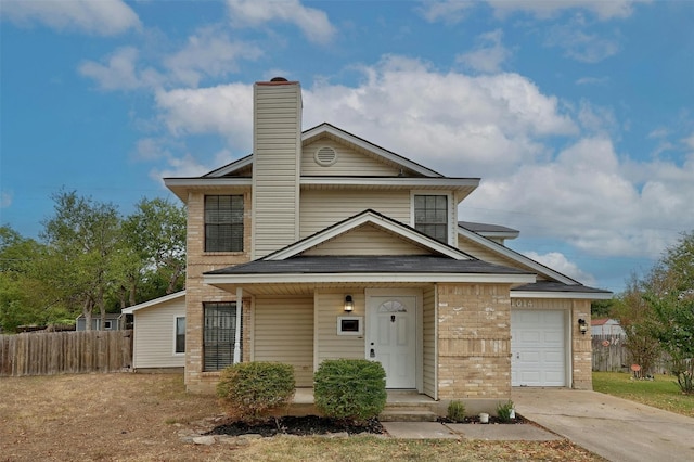 view of front of property featuring a garage