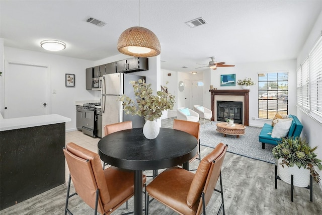 dining area with ceiling fan