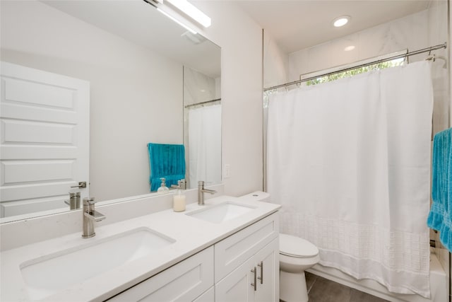 bathroom with toilet, vanity, a shower with shower curtain, and tile patterned flooring