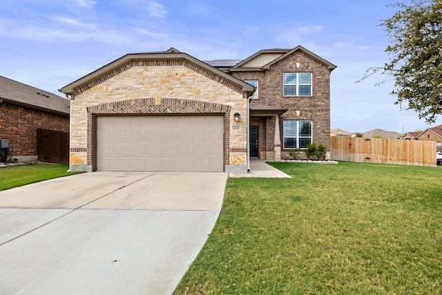 424 Hendelson Ln, Hutto, TX 78634 - view of front of house featuring concrete driveway, solar panels, a garage, brick siding, and stone siding
