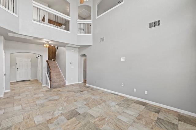 interior space with a high ceiling