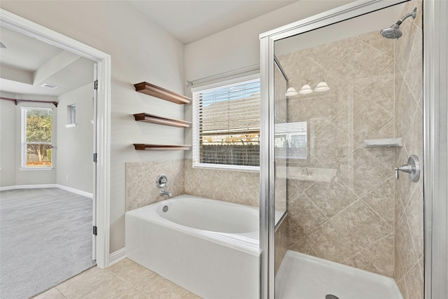 bathroom with plus walk in shower and tile patterned floors