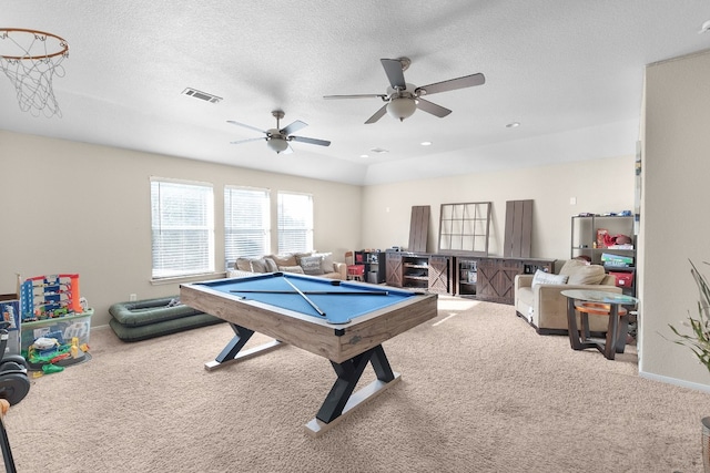 game room featuring a textured ceiling, billiards, carpet flooring, and ceiling fan