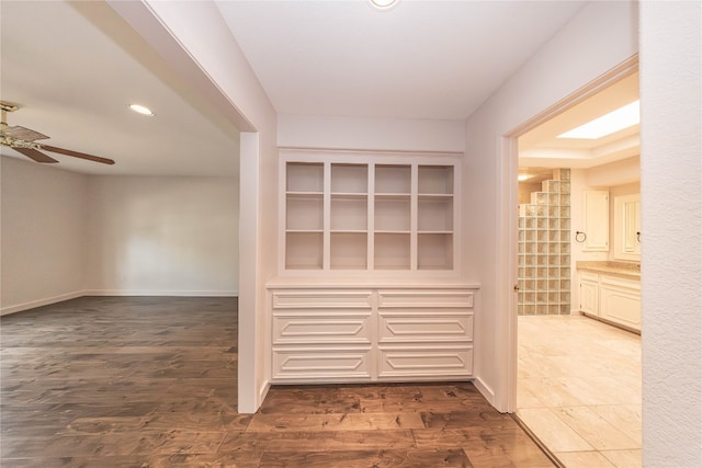 hallway featuring hardwood / wood-style flooring