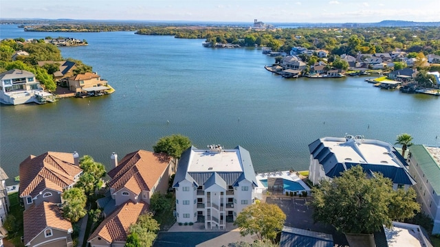 bird's eye view with a water view