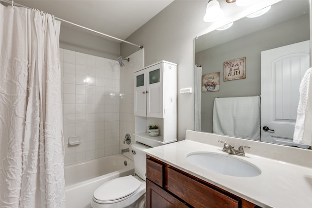 full bathroom featuring vanity, toilet, and shower / bath combination with curtain