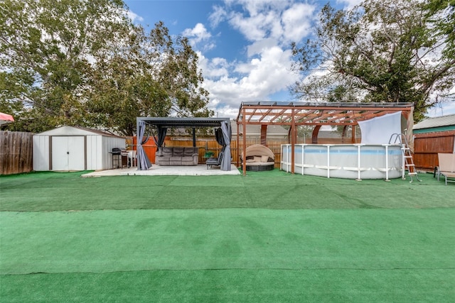 view of yard featuring a pergola, a gazebo, a shed, a patio, and a fenced in pool