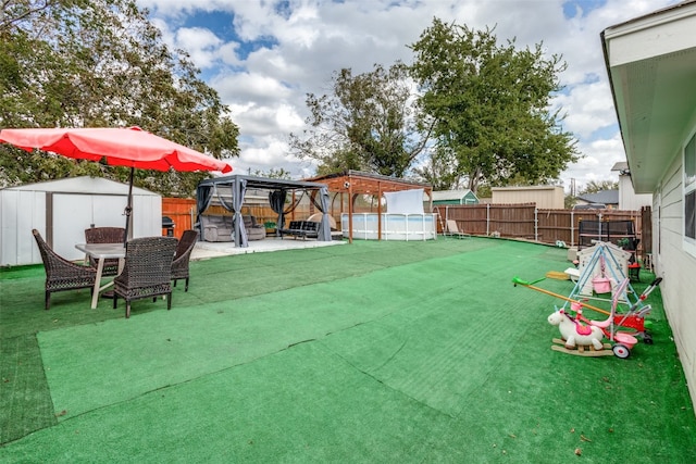 view of yard with a patio and a gazebo