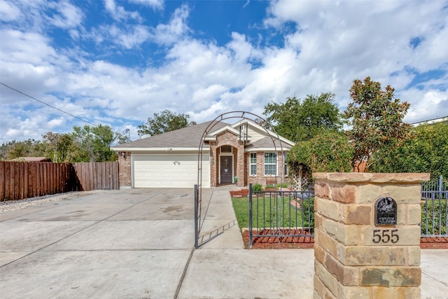 view of front facade with a front yard and a garage