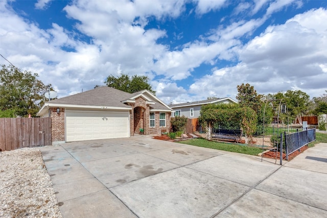 ranch-style home featuring a garage